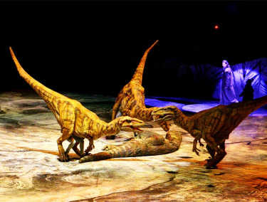 The dinosaurs were fighting on the stage (8)