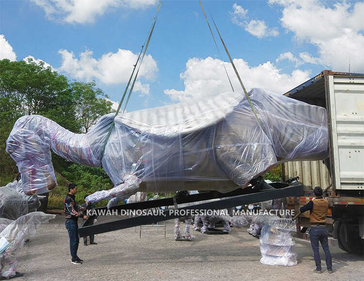 Kontenitur tat-tagħbija tal-mudell tad-dinosawri Spinosaurus animatronic ta' 15-il metru (1)