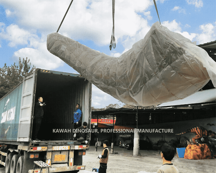 5 Animatronic Dinosaurs Diamantinasaurus load into container.